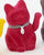 Howdy Haunts Flocked Waving Cat